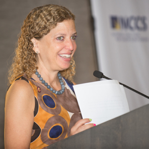 Photo of Debbie Wasserman Schultz speaking at an NCCS event