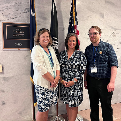 Marielle (center) advocates for survivorship legislation at Sen. Tim Scott's office during NCCS Hill Day, June 2024.