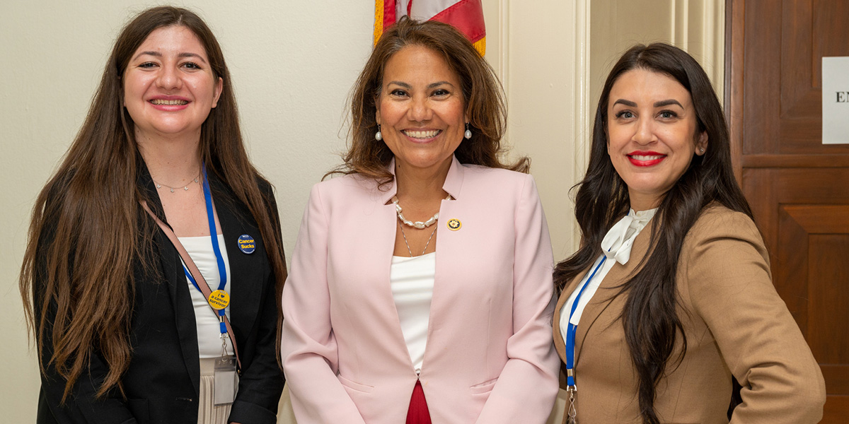 Rebecca Muñoz smiling with US Rep. Veronica Escobar