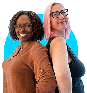 Two women posing back-to-back with a light blue background