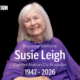 a picture of susie leigh similing wearing a purple top. Words over the photo read In loving memory, Susie Leigh, Cancer Nation Co-founder, 1947-2026