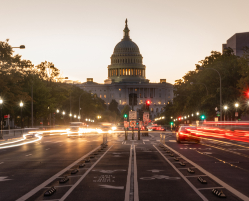 Commuters are already moving about before dawn on the streets of Washington DC United States Capital City