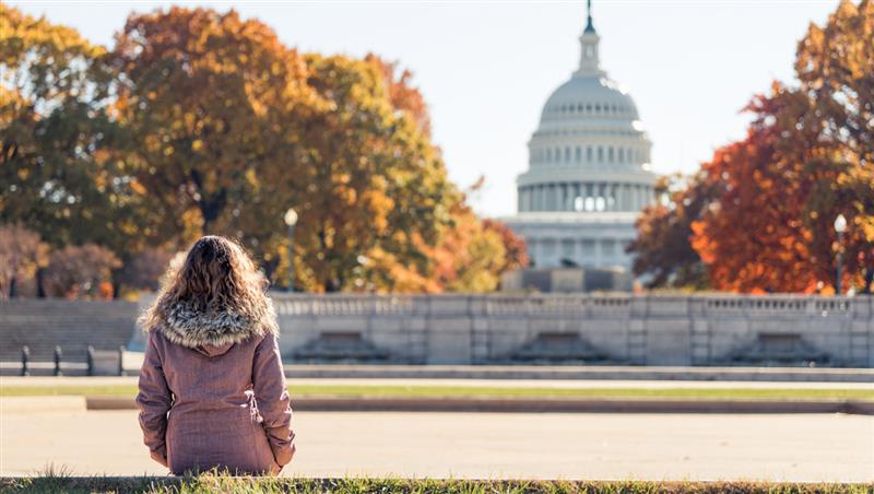 Woman facing the Washington DC Capitol building